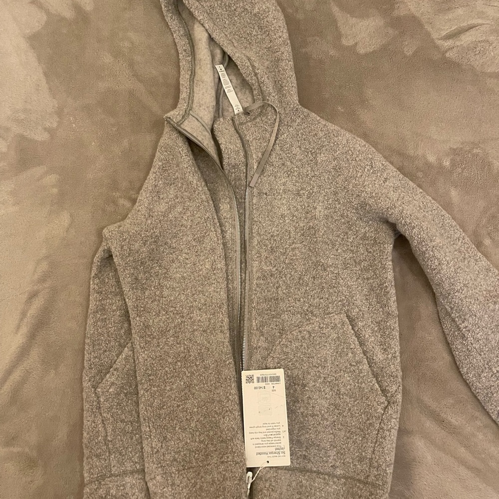 Brand new so Sherpa hooded jacket by Lululemon